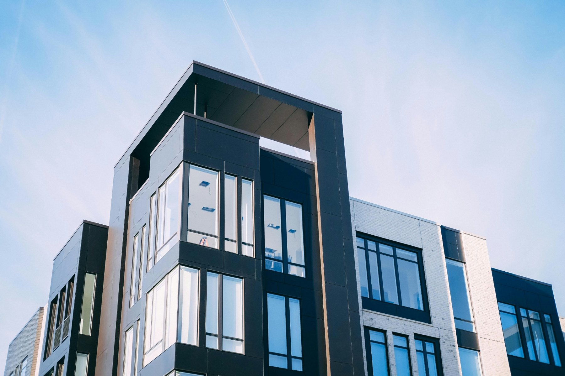 Modern apartment building with bright, well-presented exterior